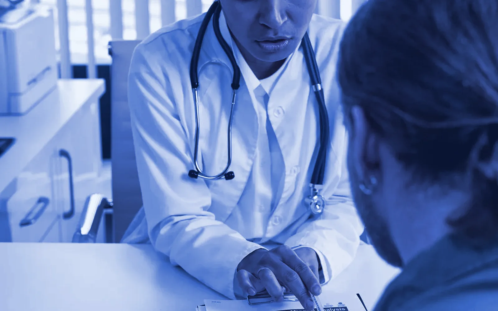Doctor consulting with a patient